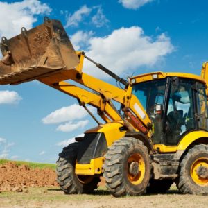 depositphotos_7141372-stock-photo-excavator-loader-with-backhoe-works